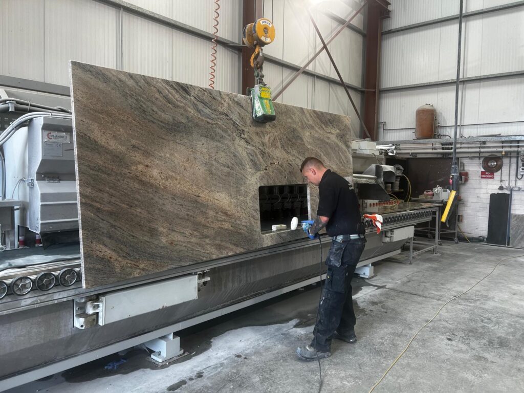 a large, bespoke stone kitchen worktop manufacturing